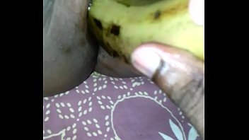 Tamil girl play with banana