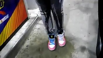 desperate girl wetting pee jeans while pumping gas