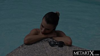 Gorgeous brunette skinny-dipping and stroking her shaved pussy