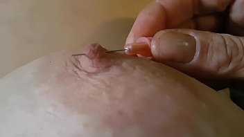 I love the pain of pushing a needle through my hard nipple, then playing with it to make me cum incredibly hard