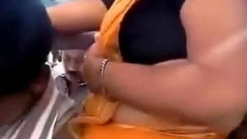 aunty pressed by public in festival romantic aunty helping pepole to press her