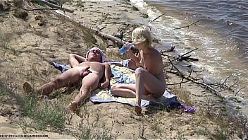Nudists fuck on the beach