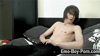 Hot emo guy Mikey Red disrobes down to his tight ebony and blue