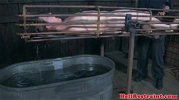 Caged submissive in drowning fetish
